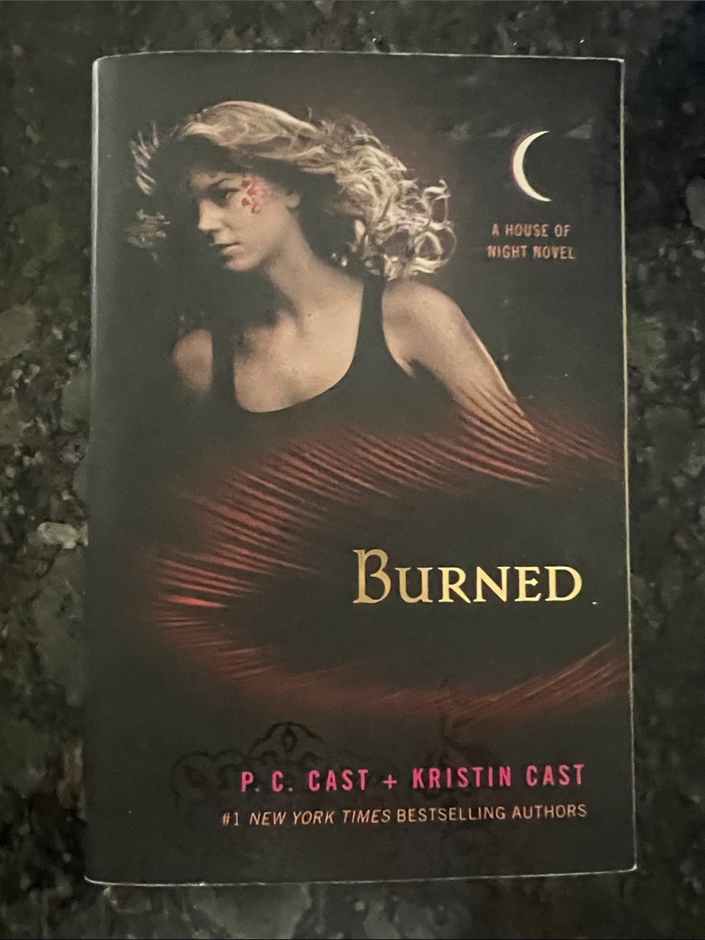 Burned by - Black/Red Paperback Novel